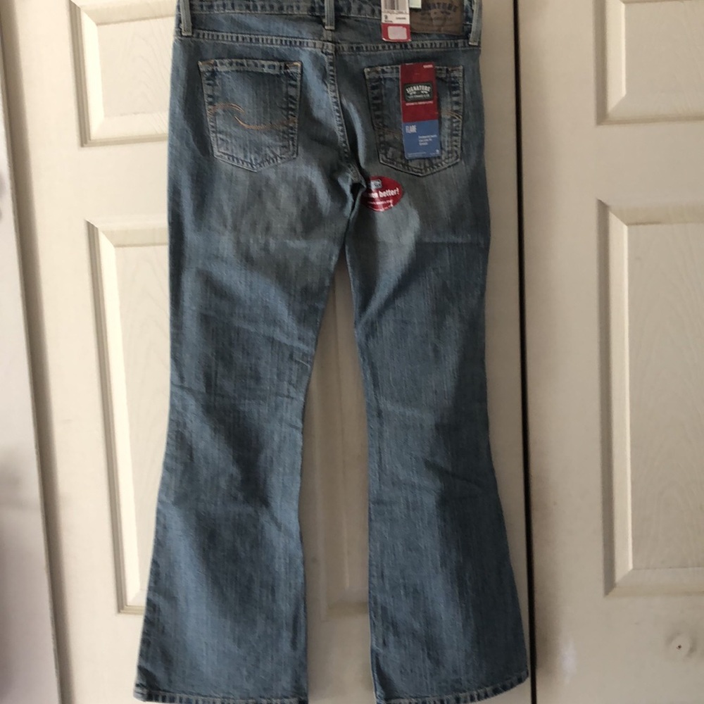 NWT. Levi’s Signature jeans. Low rise stretch flare jeans. Price lowered!